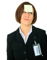 Confused Businesswoman With Blank Note