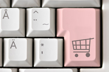 The button for purchases on the keyboard. Online shop.