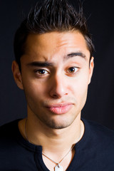 Incredulous funny man with eyebrow raised