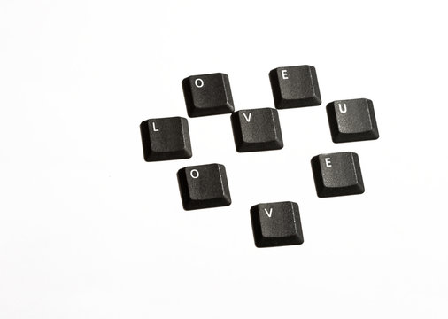 Symbol heart made with buttons of keyboard