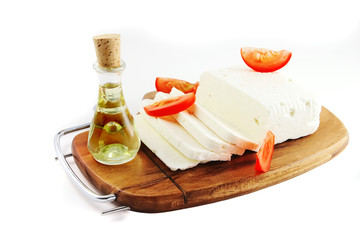 white goat cheese on wooden cut board