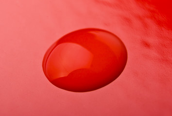 Water Drop on Red background