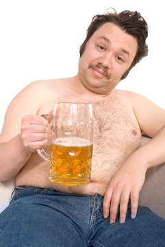 Overweight man with a beer glass