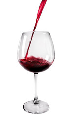 Red Wine Poured into Glass on White