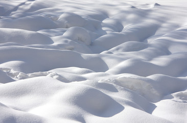 Snow hills in a far wood