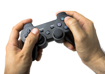 Male Hand Using Console Game Controller on White