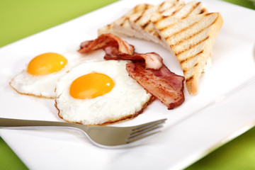 Breakfast - toasts, eggs, bacon