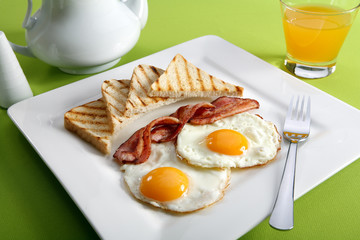 Breakfast - toasts, eggs, bacon