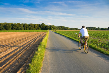 Riding a bike in the countryside