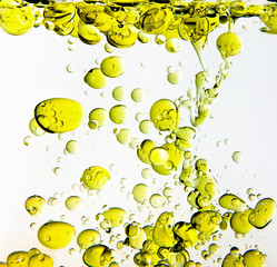 Olive Oil Poured into Water