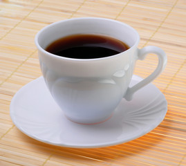 Cup of aromatic coffee on good beginning of day