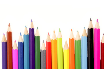 Colored pencils on white background