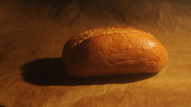 Baking a bread roll in the oven