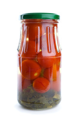 Glass jar with marinated cherry tomatoes