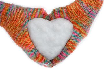 heart of snow in gloves