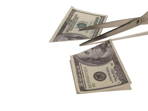 Scissors Cutting 100 Dollar Bill