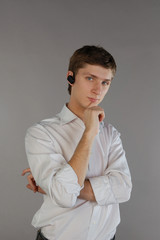 Young man with a bluetooth headset