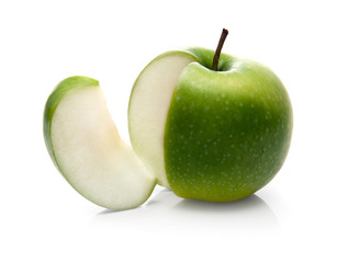 green apple and slice isolated over a white background