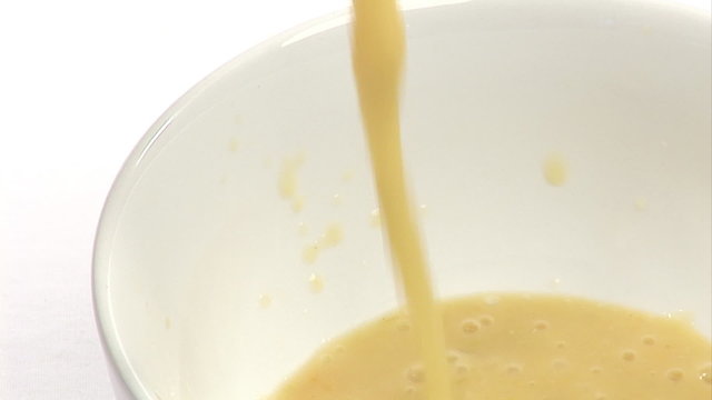 Pouring soup in a bowl footage
