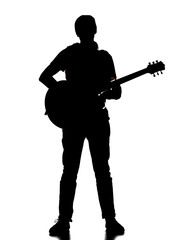 silhouette of a man playing guitar