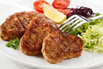 Grilled meat with vegetable salad