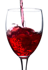 pouring red wine in glass
