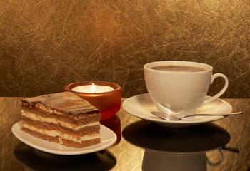 A cup of coffee and cake