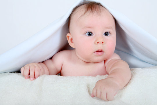 Little baby under towel