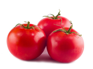Three Red, Ripe Tomatoes on White