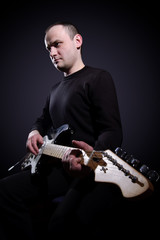 Obraz premium Musician playing guitar