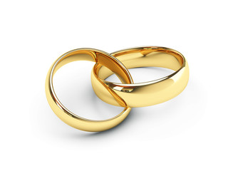 Wedding golden rings one over another. Isolated