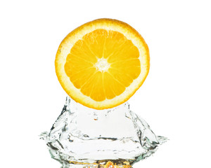 Fototapeta na wymiar Fresh orange in water.