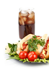 Hot dog with vegetables and cola