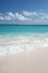 Fototapeta na wymiar Tropical Paradise - White Sand Beach and Ocean Background