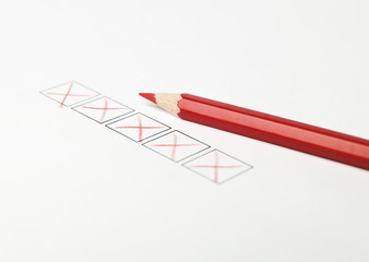 Red pen with check boxes