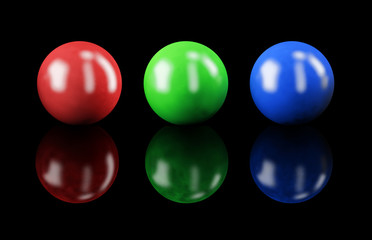 Set of balls isolated on black: RGB colors