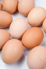 Photo of many brown hen eggs
