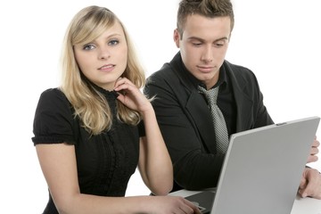 Businesspeople couple with laptop on table