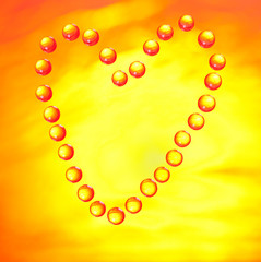 Heart of water droplets on glass