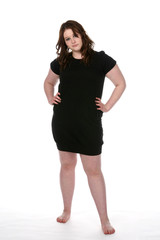 overweight girl in short black dress and bare feet