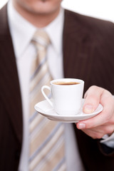 Mann im Anzug mit Kaffee