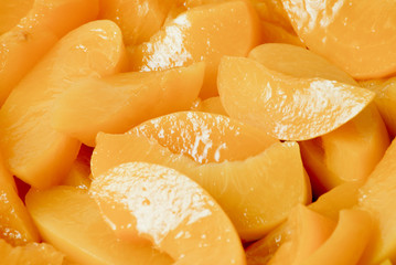 group of syrup peaches.