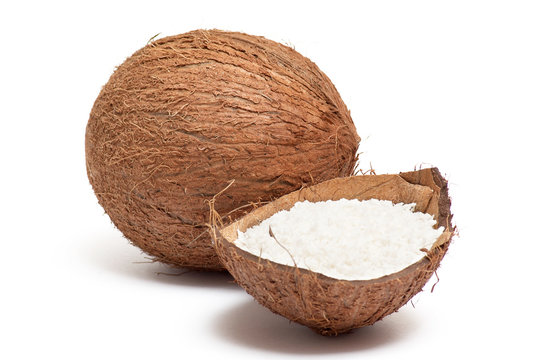 Part Of Coconut With Powder Inside Shell .