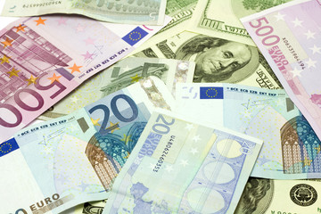 Fototapeta na wymiar Dollar and euro banknotes