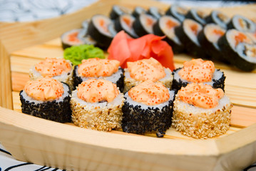 sushi on wood plate