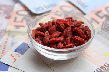 wolfberry with euro banknotes