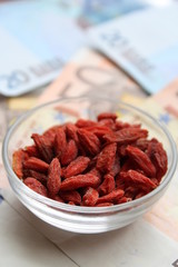 wolfberry with euro banknotes