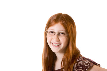 Friendly redhead Pre-Adolescent girl in glasses