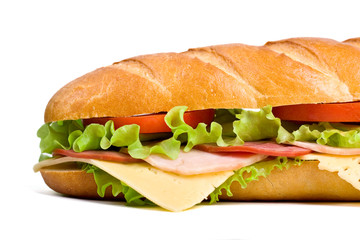 baguette sandwich with lettuce, tomatoes, meat and cheese