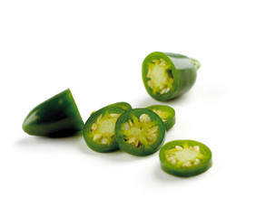 jalapenos sliced on white background